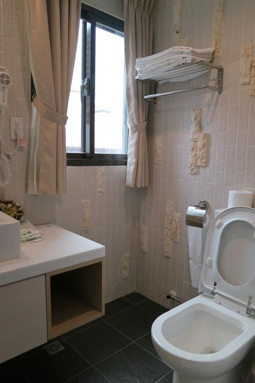 茶源旅店-潭暉魚池館 Apartamento Yuchi Exterior foto