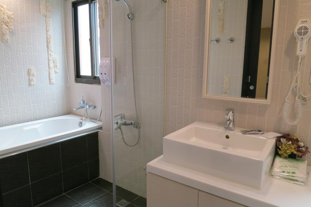 茶源旅店-潭暉魚池館 Apartamento Yuchi Exterior foto